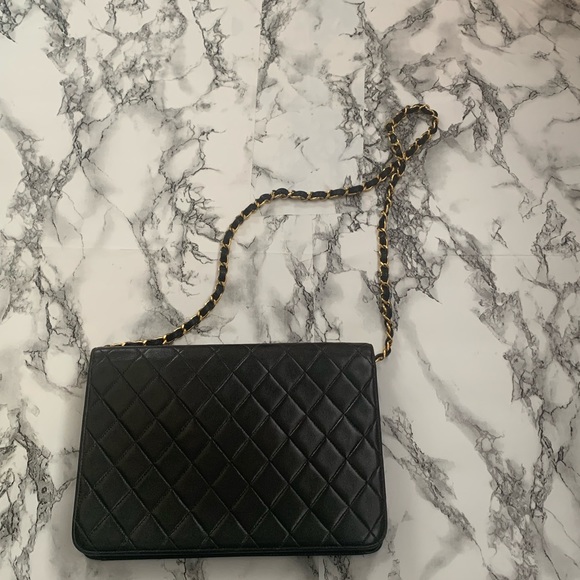 Chanel
 Clutch or Crossbody with Chain Quilted Leather Medium - Picture 2 of 6